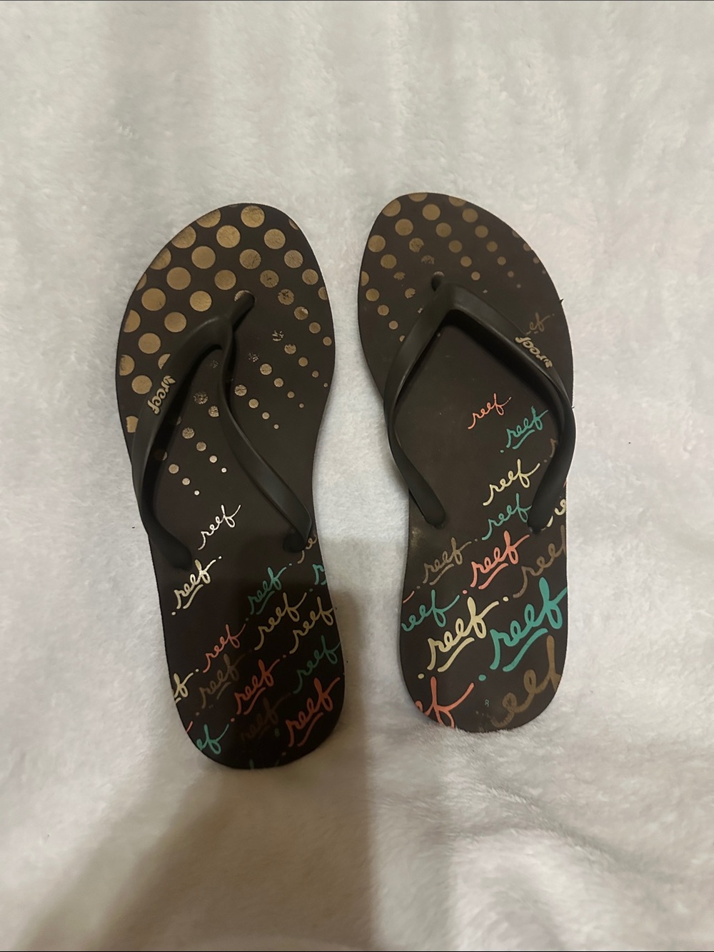 Reef Women’s Brown Flip Flops with Multicolor Script
